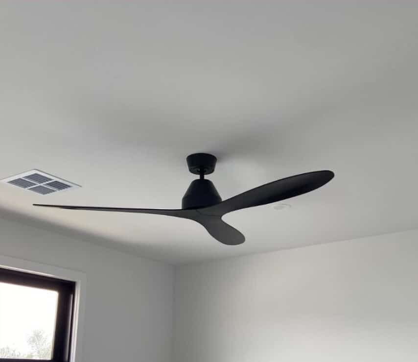Modern black ceiling fan installed in a Melbourne home, showcasing professional ceiling fan installation, replacement, and repair services by Approved Electrix